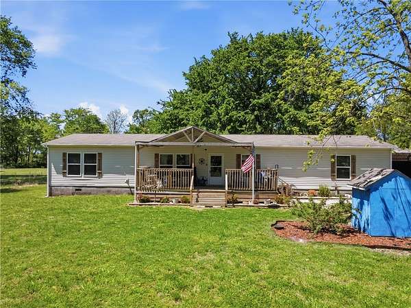 11.3 Acres of Land with Home for Sale in Gentry, Arkansas