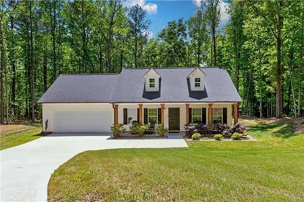 1.5 Acres of Land with Home for Sale in Commerce, Georgia