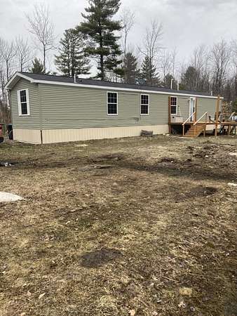 15.2 Acres of Recreational Land with Home for Sale in Moira, New York