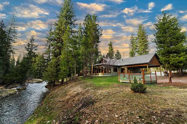 1.76 Acres of Land with Home for Sale in Seeley Lake, Montana