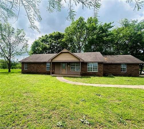 3.55 Acres of Land with Home for Sale in Heavener, Oklahoma
