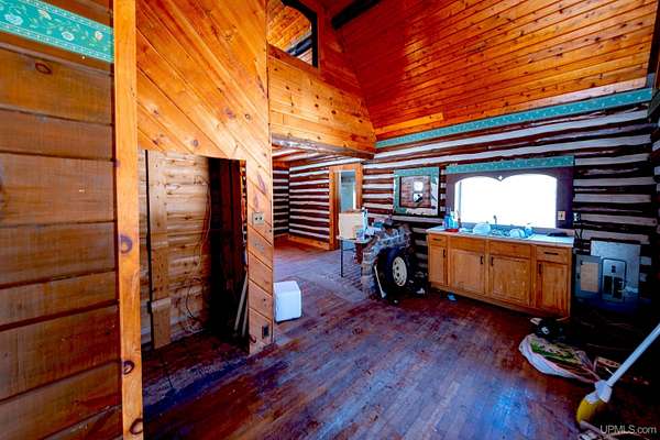 10 Acres of Recreational Land with Home for Sale in Rapid River, Michigan