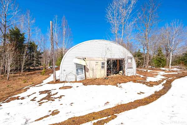 20 Acres of Recreational Land with Home for Sale in Rock, Michigan