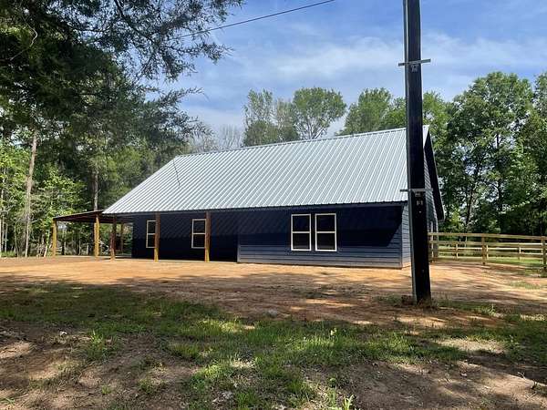 1.83 Acres of Land with Home for Sale in Douglass, Texas