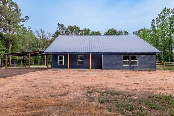 1.83 Acres of Land with Home for Sale in Douglass, Texas