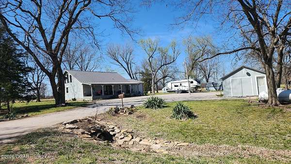 7 Acres of Land with Home for Sale in Girard, Kansas