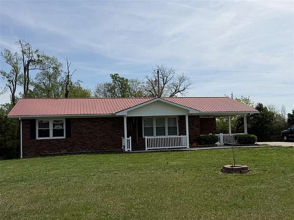 1.54 Acres of Land with Home for Sale in Scottsville, Kentucky