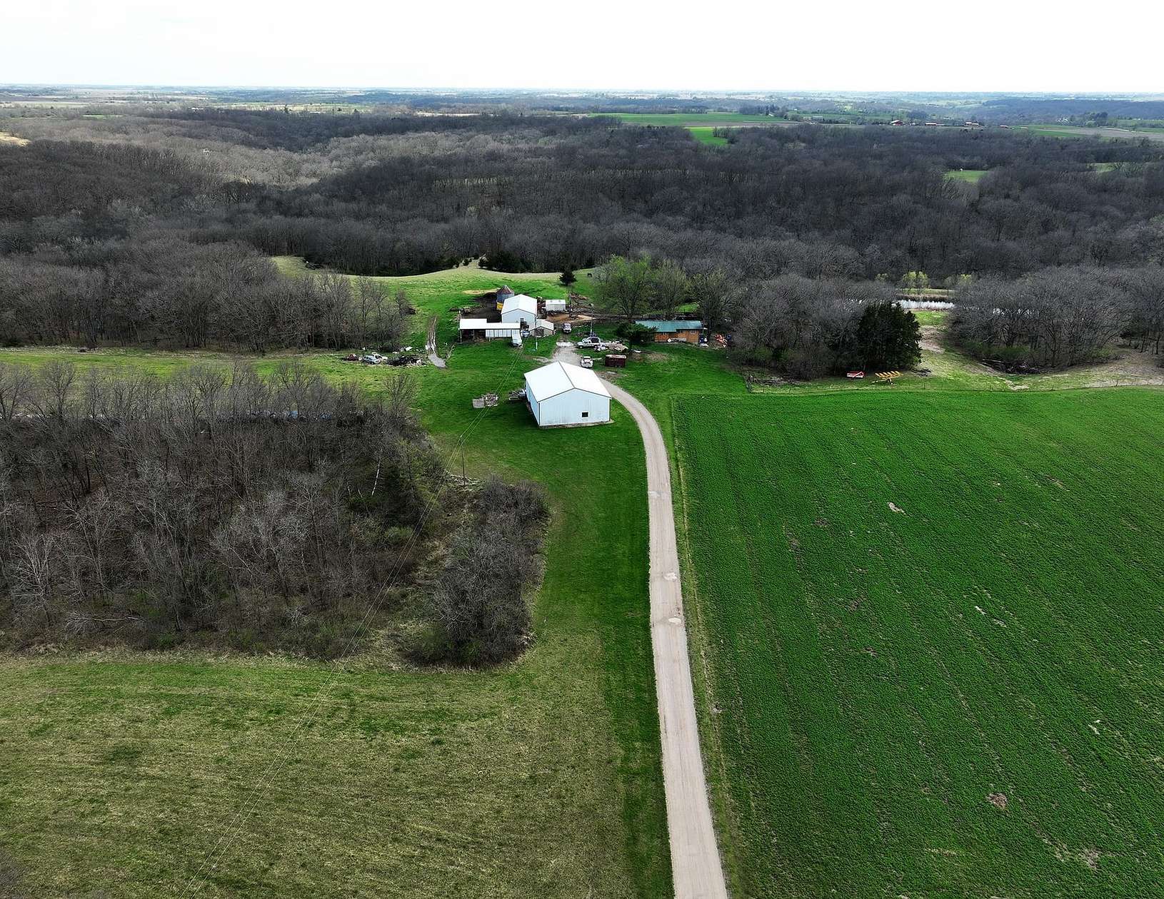 67.1 Acres of Recreational Land with Home for Sale in Russell, Iowa
