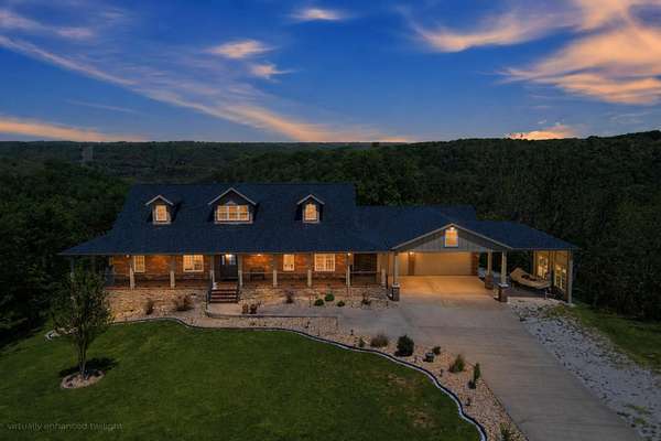 6.6 Acres of Land with Home for Sale in Reeds Spring, Missouri