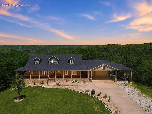 6.6 Acres of Land with Home for Sale in Reeds Spring, Missouri