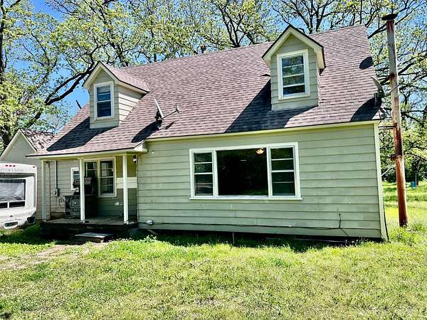 9.85 Acres of Land with Home for Sale in Coffeyville, Kansas