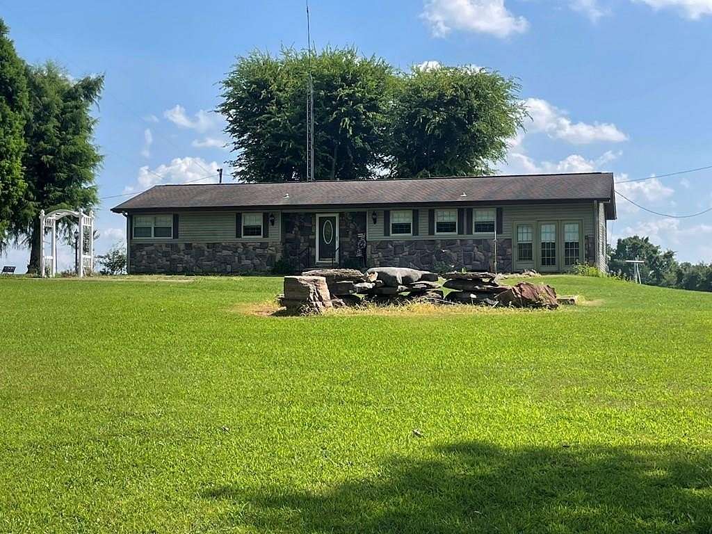 3 Acres of Land with Home for Sale in Big Sandy, Tennessee