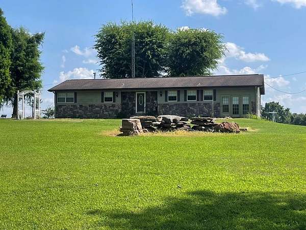 3 Acres of Land with Home for Sale in Big Sandy, Tennessee