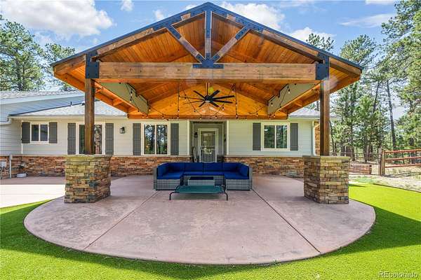 4.9 Acres of Land with Home for Sale in Larkspur, Colorado