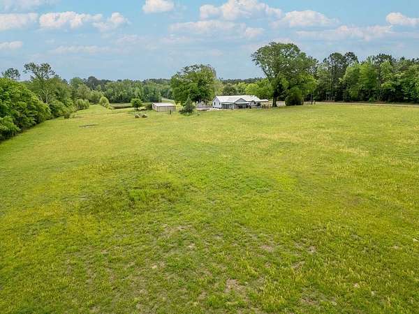 11.4 Acres of Land with Home for Sale in Linden, Texas