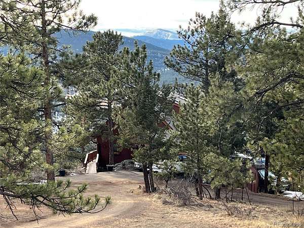 0.61 Acres of Land for Sale in Evergreen, Colorado