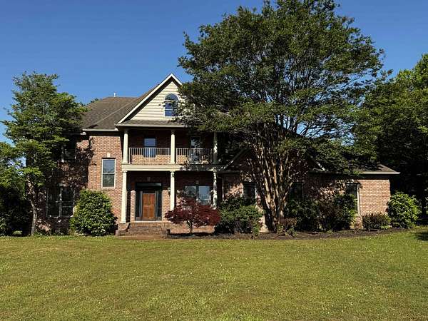 5 Acres of Land with Home for Sale in Covington, Tennessee