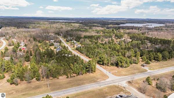 0.86 Acres of Commercial Land for Sale in Interlochen, Michigan