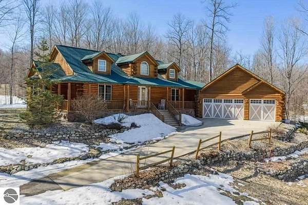 1.75 Acres of Land with Home for Sale in Bellaire, Michigan