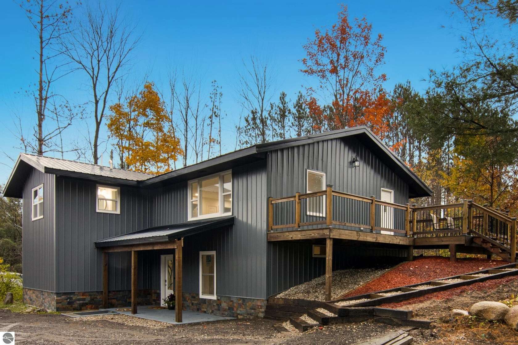 3 Acres of Land with Home for Sale in East Jordan, Michigan