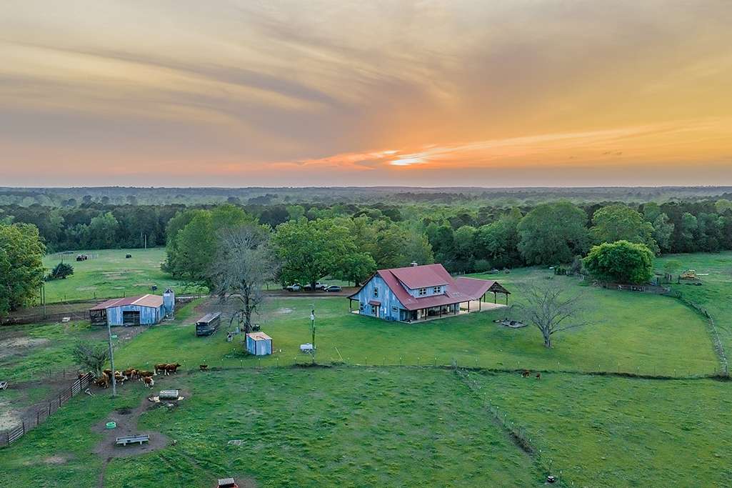 55 Acres of Land with Home for Sale in Atlanta, Texas