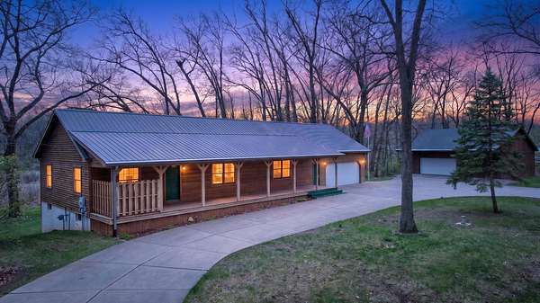 23 Acres of Recreational Land with Home for Sale in Horton, Michigan