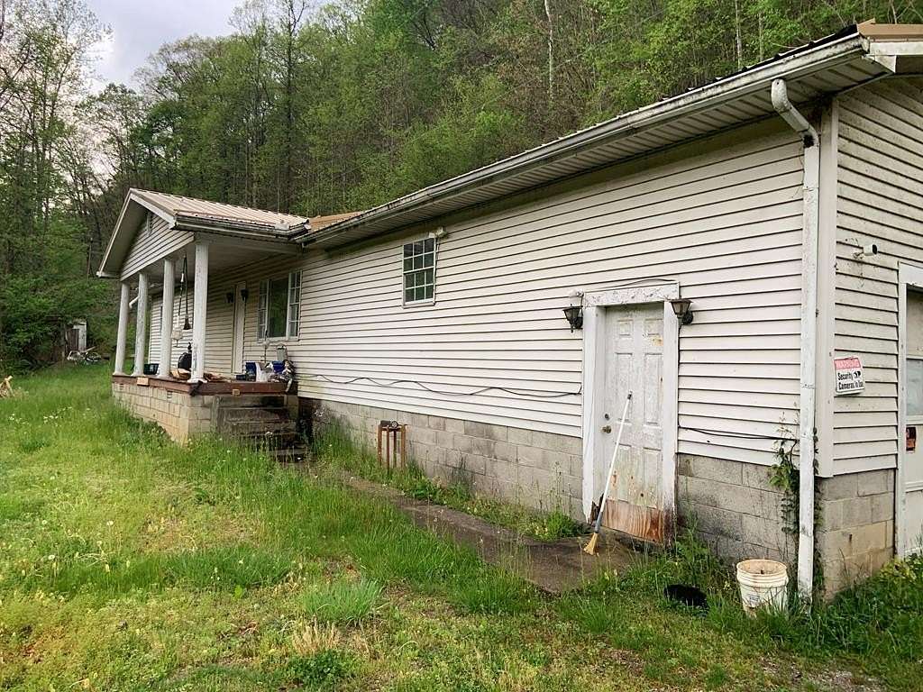 5.6 Acres of Land with Home for Sale in Pikeville, Kentucky