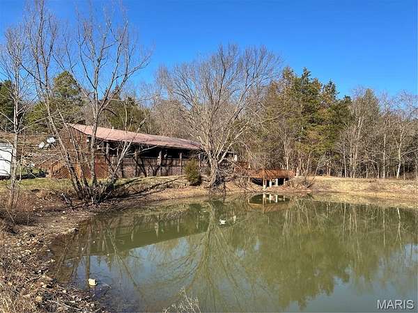 21.5 Acres of Recreational Land with Home for Sale in Des Arc, Missouri
