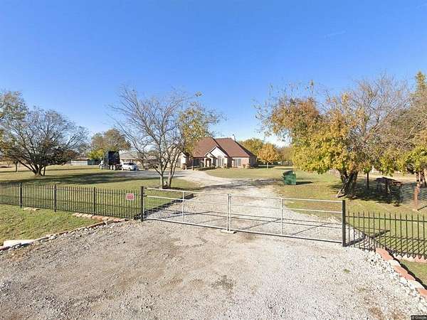 2.5 Acres of Land with Home for Sale in Justin, Texas