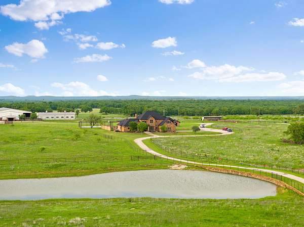 156 Acres of Agricultural Land with Home for Sale in Jacksboro, Texas