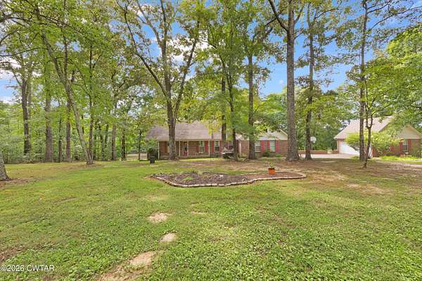 5.8 Acres of Land with Home for Sale in Milan, Tennessee