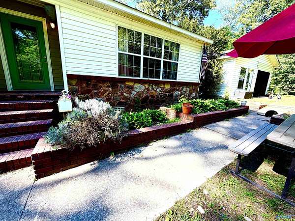 5.84 Acres of Land with Home for Sale in Arab, Alabama