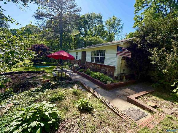 5.84 Acres of Land with Home for Sale in Arab, Alabama