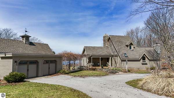 6.59 Acres of Land with Home for Sale in Suttons Bay, Michigan