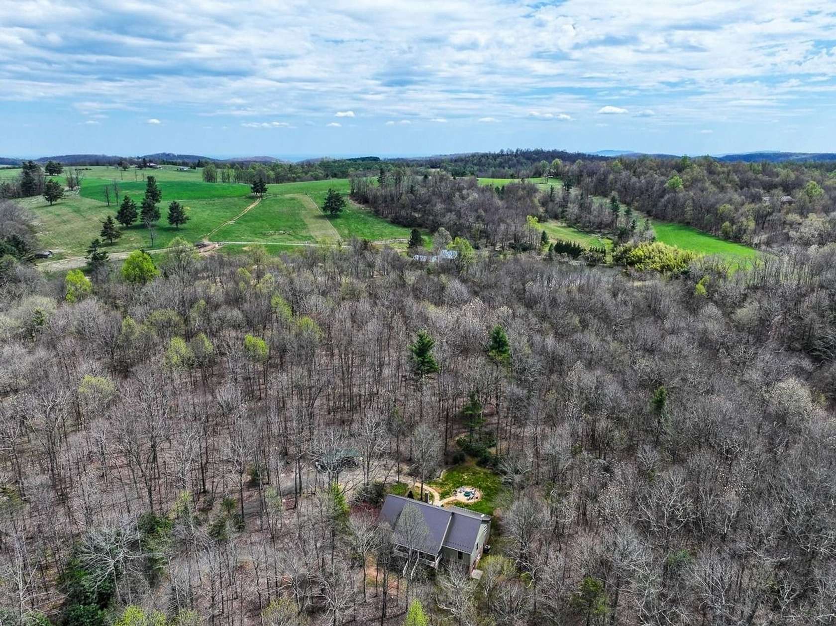 39.2 Acres of Land with Home for Sale in Meadows of Dan, Virginia
