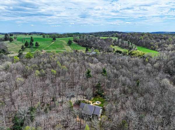 39.2 Acres of Land with Home for Sale in Meadows of Dan, Virginia