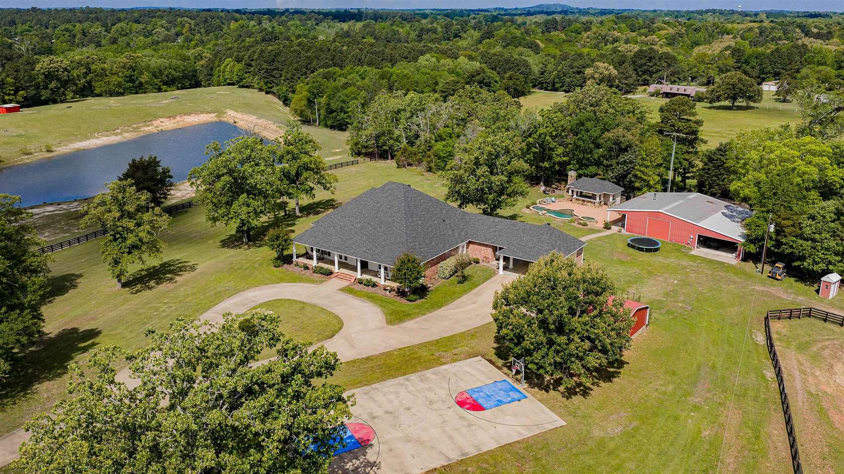 24.4 Acres of Recreational Land with Home for Sale in Gilmer, Texas