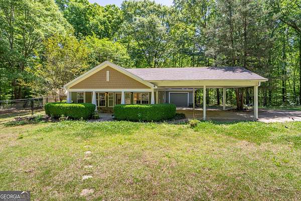 6.66 Acres of Land with Home for Sale in Buckhead, Georgia