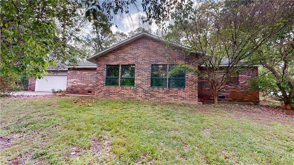 2.4 Acres of Land with Home for Auction in Joplin, Missouri