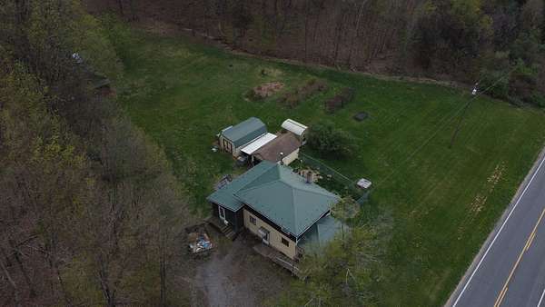 5.22 Acres of Land with Home for Auction in Muncy, Pennsylvania
