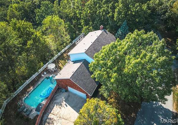 7.65 Acres of Land with Home for Sale in St. Robert, Missouri