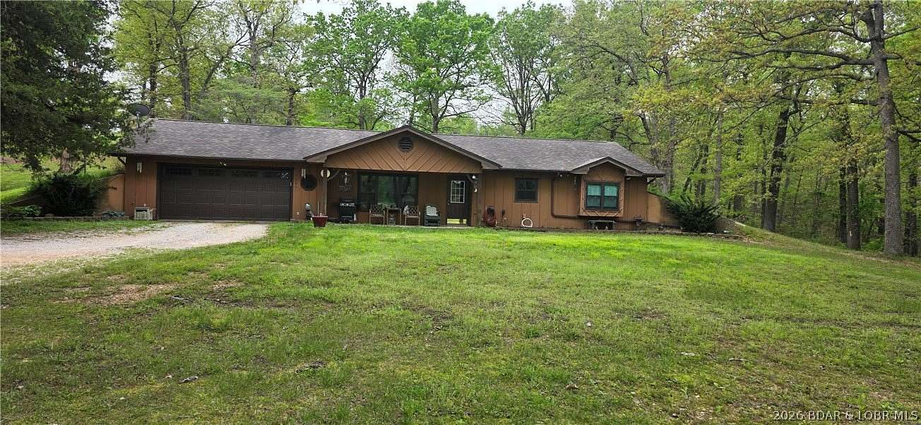 11.5 Acres of Land with Home for Sale in Camdenton, Missouri