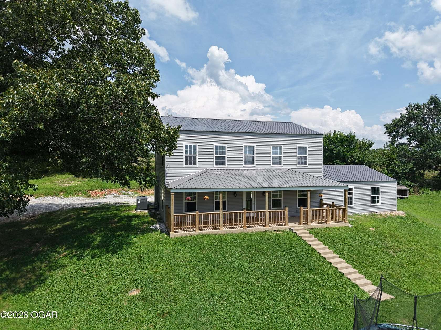 9.84 Acres of Land with Home for Sale in Neosho, Missouri
