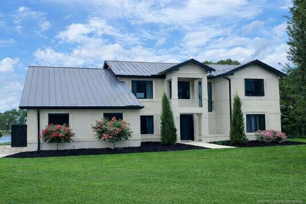 4.33 Acres of Land with Home for Sale in Palm City, Florida