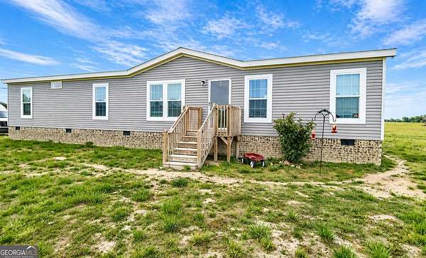 6.1 Acres of Land with Home for Sale in Comer, Georgia