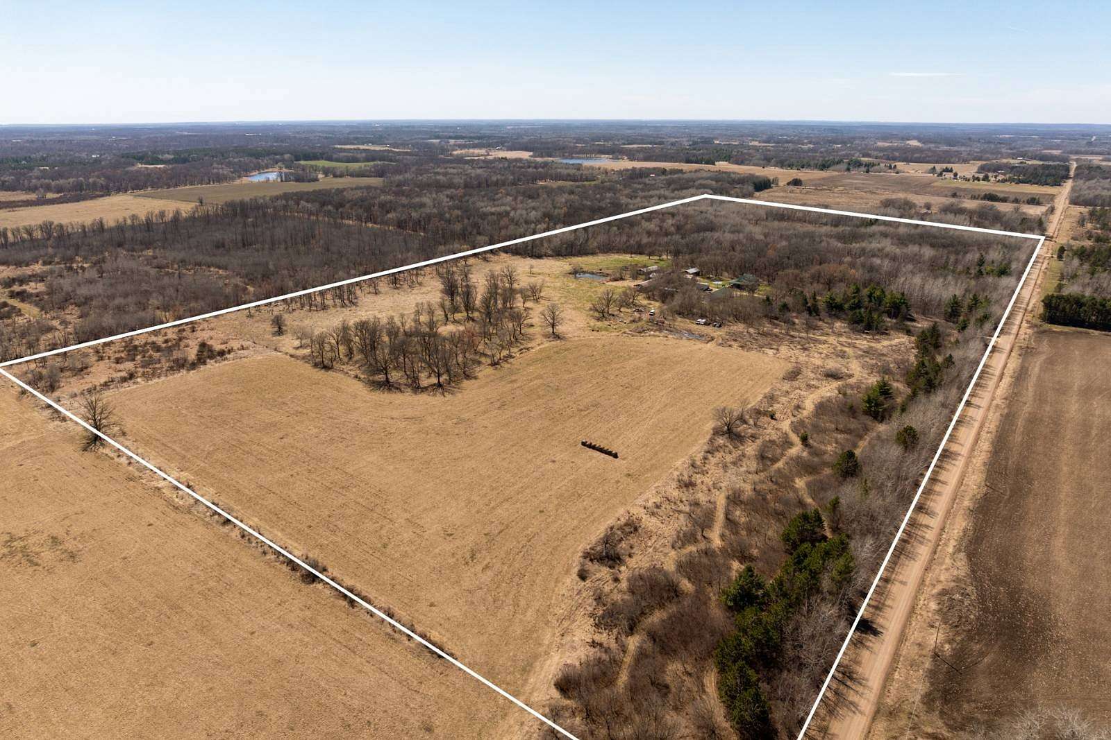 80 Acres of Land with Home for Sale in St. Mathias Township, Minnesota