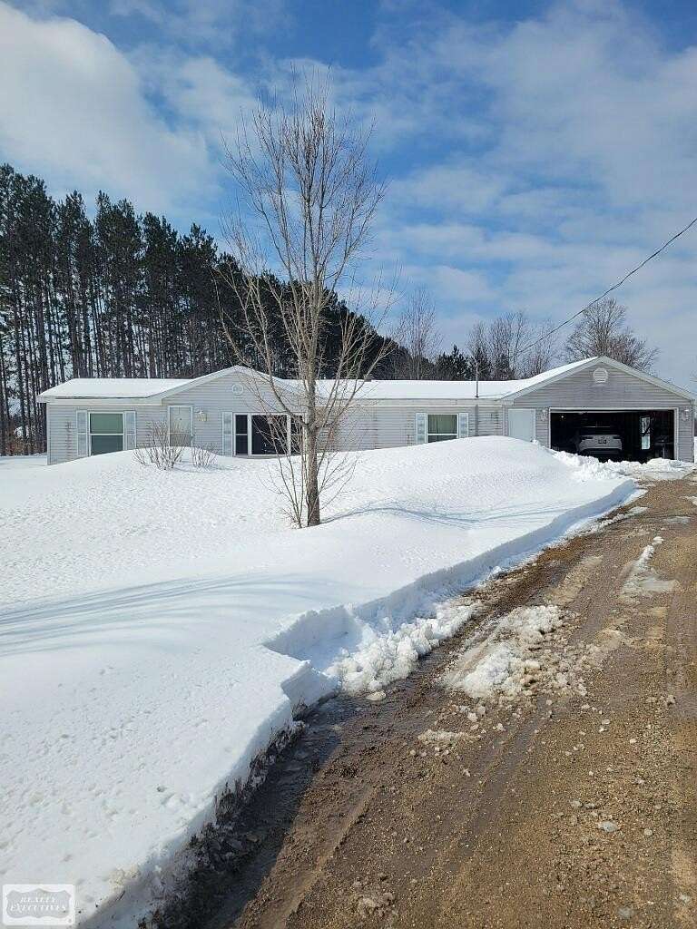 10 Acres of Land with Home for Sale in Rapid City, Michigan