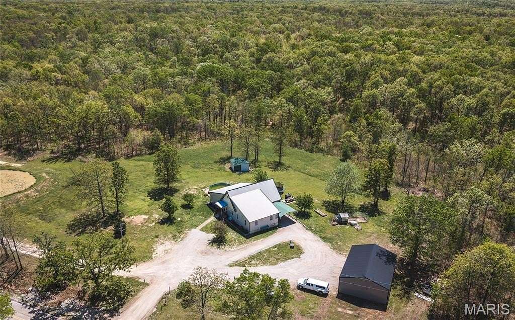 5 Acres of Land with Home for Sale in Lebanon, Missouri