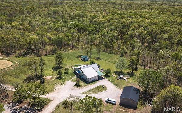 5 Acres of Land with Home for Sale in Lebanon, Missouri