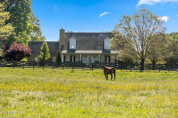 5.7 Acres of Land with Home for Sale in Corryton, Tennessee